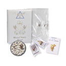 5-piece Girls Blessed Trinity First Communion Set featuring a white rosary, prayer book, scapular, pin, and clear pouch.